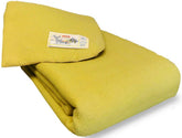 Een Orion deken van het merk Aabe dekens in de kleur citroengeel gemaakt van merinowol